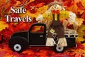 Safe Travels message with old retro truck and a scarecrow