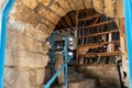 Looking inside through the entrance to the old stone building of the Establishment of Kosov Jewish Community Zfat in the old part Royalty Free Stock Photo