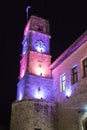 Night view of the clock tower of Wolfson Community Center building in a square in the old city of Safed in northern Israel Royalty Free Stock Photo