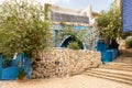 A stone staircase leading up from the corner of one of quiet streets with stone houses in the old part of Safed city in northern
