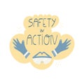 Safety in action handwritten phrase with safety glasses and gloves Royalty Free Stock Photo