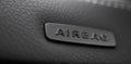 Safety airbag sign on car, luxury sport car interior background