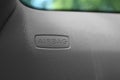 Safety airbag sign on door in car, closeup Royalty Free Stock Photo