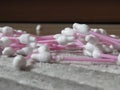 A pile of spilled Safety baby cotton buds. Ear sticks with cotton buds for cleaning ears. Royalty Free Stock Photo