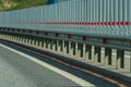 Safety barriers on highway. Anodized safety steel barrier. Enhancing highway safety. Royalty Free Stock Photo
