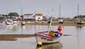 Safety boat and tide mill at Woodbridge on the Deben Estuary Royalty Free Stock Photo