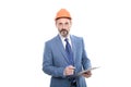 safety business expertise. successful man in hardhat making notes. entrepreneur read project. Royalty Free Stock Photo