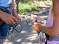 Safety carbines climbing equipment in children`s hands