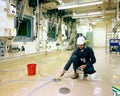 A safety compliance worker at a nuclear fuel storage facility.