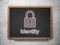 Safety concept: Closed Padlock and Identity on chalkboard background Royalty Free Stock Photo