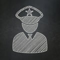 Safety concept: Police on chalkboard background