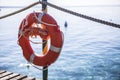 Safety on the dock: Red Lifesaver at Lake Garda
