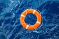 Safety equipment, Life buoy or rescue buoy floating on sea to rescue people from drowning man Royalty Free Stock Photo