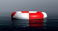 Safety equipment, Life buoy or rescue buoy floating on sea to rescue people from drowning Royalty Free Stock Photo