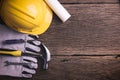 Safety equipment and tool kit on wooden background Royalty Free Stock Photo