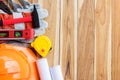 Safety equipment and tool kit on wooden table background Royalty Free Stock Photo