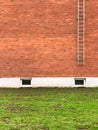 Safety exit ladders on brick wall building