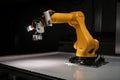 safety feature on robotic arm, with light and audible alarms to indicate danger
