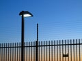 Safety fence lighted by dusk Royalty Free Stock Photo