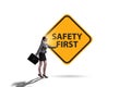 Safety first badge with business people Royalty Free Stock Photo