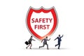 Safety first badge with business people Royalty Free Stock Photo