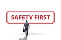 Safety first badge with business people Royalty Free Stock Photo