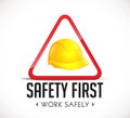 Safety first concept - work safely sign yellow helmet as warning sign Royalty Free Stock Photo