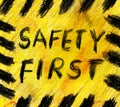 Safety first grunge sign handmade colored pencil illustration,yellow with hazard stripes,isolated on white background