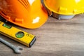 Safety first hard helmet hat and engineer tool with copy space, engineering construction and architecture concept Royalty Free Stock Photo