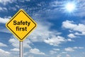 Safety first sign banner and clouds blue sky Royalty Free Stock Photo