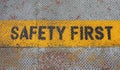 Safety First Sign on caution strip. Royalty Free Stock Photo