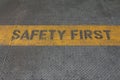Safety First Sign on caution strip Royalty Free Stock Photo