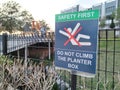 Safety First Sign to the public regarding Do Not Climb The Planter Box.