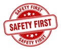 safety first stamp. safety first round grunge sign. Royalty Free Stock Photo
