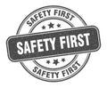 safety first stamp. safety first round grunge sign. Royalty Free Stock Photo
