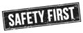 SAFETY FIRST text on black grungy rectangle stamp Royalty Free Stock Photo