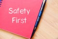 Safety first text concept on notebook Royalty Free Stock Photo