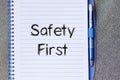 Safety first text concept on notebook Royalty Free Stock Photo