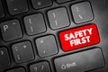 SAFETY FIRST text on a red keyboard button, concept of risk prevention and protection, workplace safety message, digital Royalty Free Stock Photo
