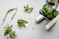 Safety food. Laboratory for food analysis. Herbs, greens under microscope on grey background top view copy space Royalty Free Stock Photo