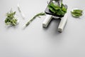 Safety food. Laboratory for food analysis. Herbs, greens under microscope on grey background top view copy space Royalty Free Stock Photo