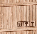 Safety fragile icon on wood box with space Royalty Free Stock Photo