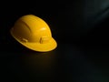 safety gear helmet on dark Royalty Free Stock Photo