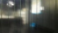 Safety glass is manufactured primarily as a fire retardant. Wired glass installation for control electrical rooms Royalty Free Stock Photo