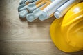 Safety gloves hard hat construction plans Royalty Free Stock Photo