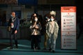 Safety guidelines billboard message on display at crowded fair place