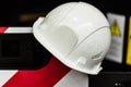 Safety helmet against industrial background