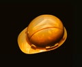 Safety helmet on dark background, Yellow helmet for labourers, Workers and Earth movers, double exposure