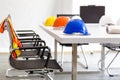 Safety helmet on table in office , engineer concept Teamwork of Royalty Free Stock Photo