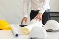 Safety helmet on table in office , engineer concept Teamwork of Royalty Free Stock Photo